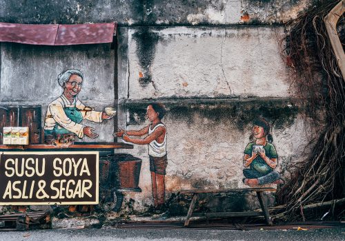 george town, malaysia. 5th may, 2023: street art 
by Ernest Zacharevic can be seen on many walls of george town, malaysia