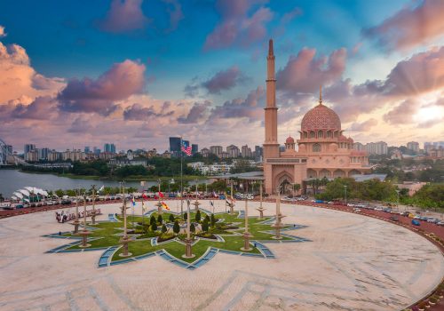 Sunset view of Putra Mosque and Putrajaya City Centre with the lake in Malaysia